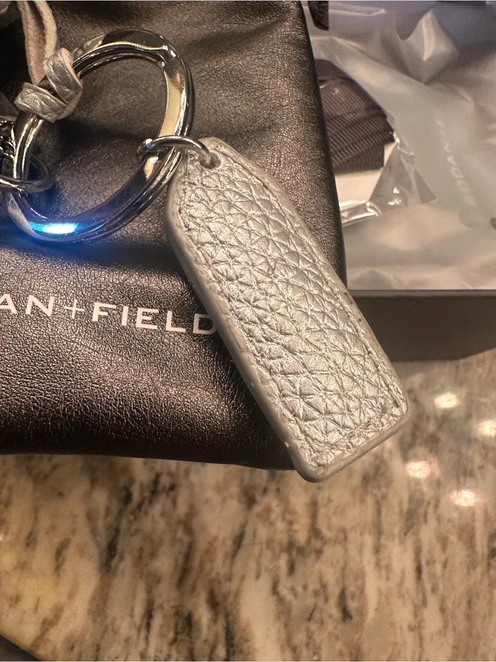 Rodan + Fields Metallic Silver Leather Key & Tassel Holder